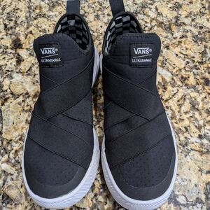 Men's black slip on Vans in wonderful condition, size 11